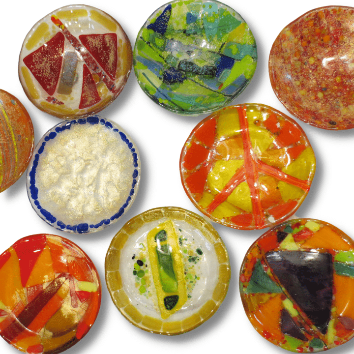 small dishes made of colorful fused glass